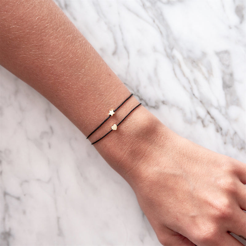 Textil Armband schwarz Stern gelbgold