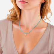 Kette mit blauen Glasperlen und Palmen-Anhänger