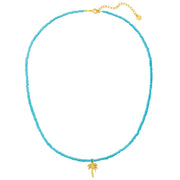 Kette mit blauen Glasperlen und Palmen-Anhänger