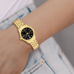 Damen Uhr Schwabing schwarz mit Edelstahl-Armband gold